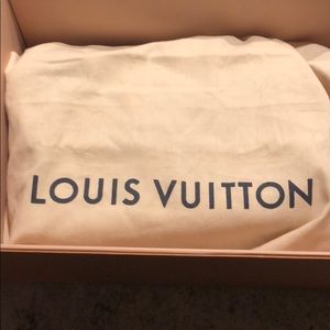 Pink Louis Vuitton bag with black trim